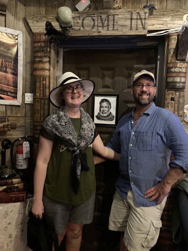 The successful escapees in front of “Papa’s Spooky Study!” (photo by Sharon Hamilton / Key West Room Escape staff)